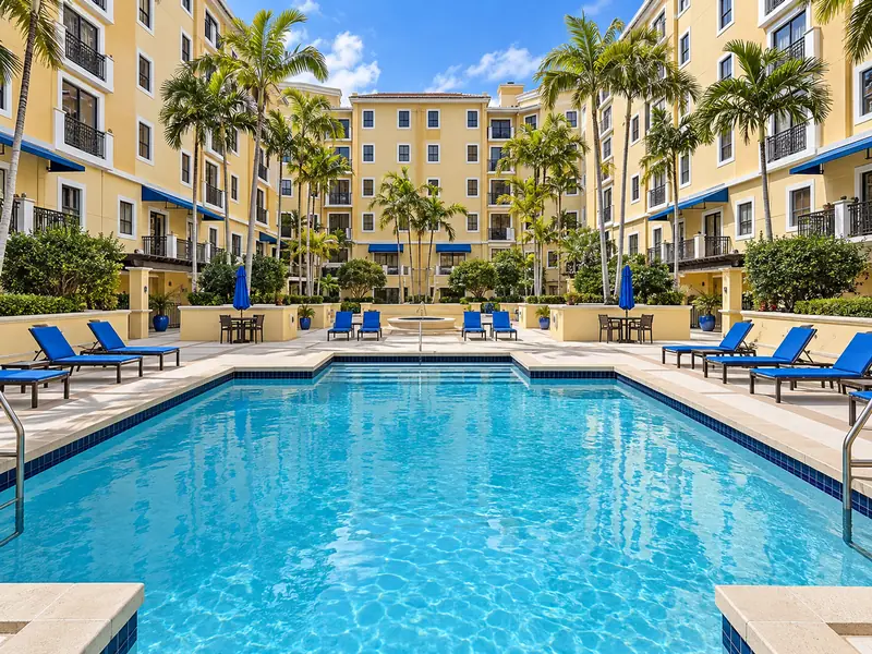 Rendering of the pool courtyard at The Colonnade, looking back toward the spa (AI-generated from the property’s photographs).